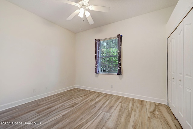 2604 Canary Isles Dr, Melbourne, FL 32901 - unfurnished bedroom with a closet, light wood-style flooring, and a ceiling fan