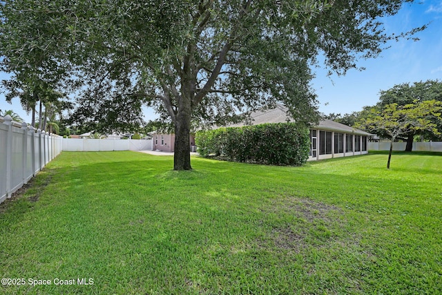 2604 Canary Isles Dr, Melbourne, FL 32901 - fenced backyard featuring a sunroom