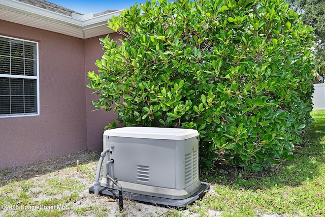 2604 Canary Isles Dr, Melbourne, FL 32901 - exterior view of stucco siding and roof with shingles