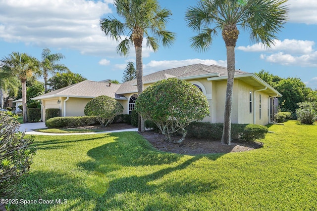 1526 Cypress Trace Dr, Melbourne, FL 32940 - view of front of property featuring stucco siding, a front yard, and an attached garage
