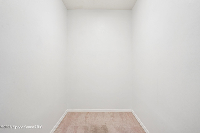 1526 Cypress Trace Dr, Melbourne, FL 32940 - spare room featuring baseboards and light colored carpet