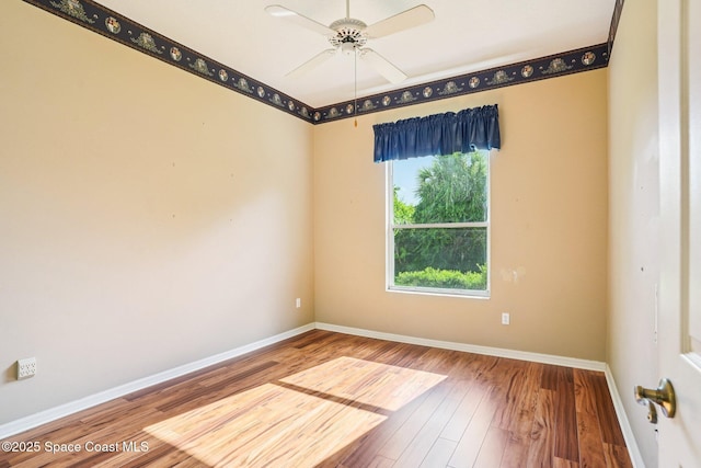 1526 Cypress Trace Dr, Melbourne, FL 32940 - spare room with wood finished floors and a ceiling fan