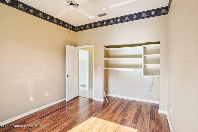 1526 Cypress Trace Dr, Melbourne, FL 32940 - empty room featuring wood finished floors and a ceiling fan