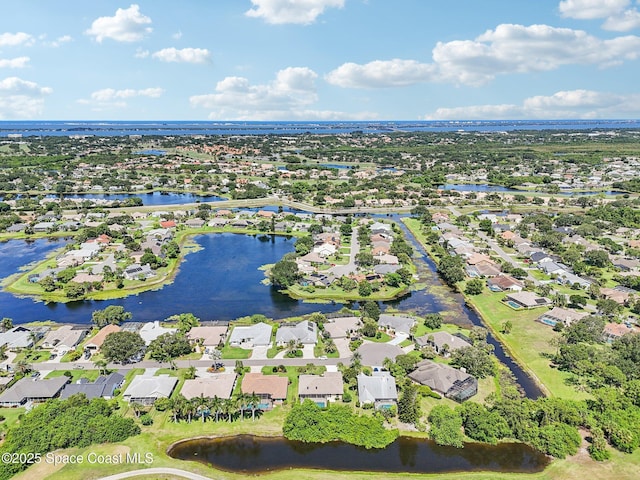 1526 Cypress Trace Dr, Melbourne, FL 32940 - aerial overview of property's location featuring nearby suburban area and a large body of water