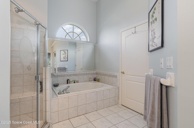 356 Fuller St SE, Palm Bay, FL 32909 - bathroom featuring a shower stall, a bath, and tile patterned floors