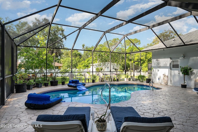 356 Fuller St SE, Palm Bay, FL 32909 - swimming pool with a patio and glass enclosure