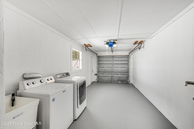 1575 Glen Haven Dr, Merritt Island, FL 32952 - laundry area with a garage and washing machine and dryer
