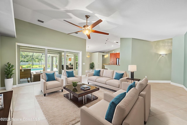 9495 Fleming Grant Rd, Sebastian, FL 32976 - living room with vaulted ceiling, light tile patterned flooring, ceiling fan, and recessed lighting
