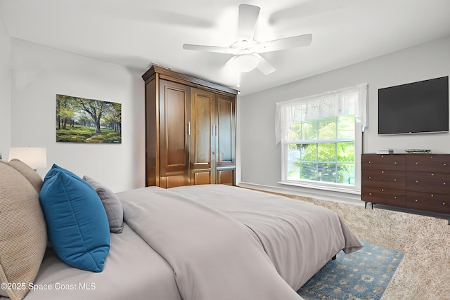 9495 Fleming Grant Rd, Sebastian, FL 32976 - carpeted bedroom featuring a ceiling fan
