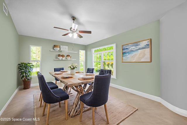 9495 Fleming Grant Rd, Sebastian, FL 32976 - dining room featuring light tile patterned floors and a ceiling fan