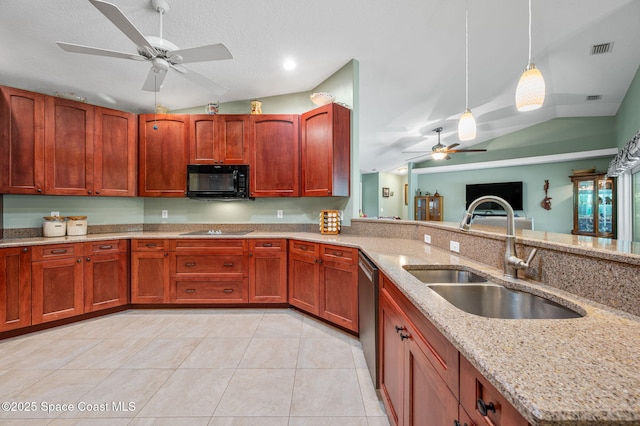 9495 Fleming Grant Rd, Sebastian, FL 32976 - kitchen with black appliances, ceiling fan, hanging light fixtures, light stone counters, and vaulted ceiling