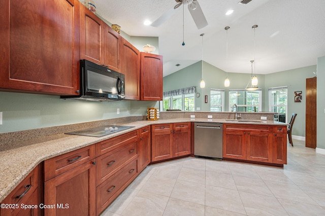 9495 Fleming Grant Rd, Sebastian, FL 32976 - kitchen featuring black appliances, vaulted ceiling, a peninsula, a ceiling fan, and plenty of natural light