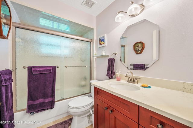 9495 Fleming Grant Rd, Sebastian, FL 32976 - bathroom featuring vanity and bath / shower combo with glass door