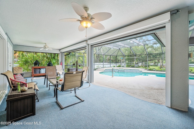 9495 Fleming Grant Rd, Sebastian, FL 32976 - outdoor pool featuring ceiling fan, a patio, and a lanai
