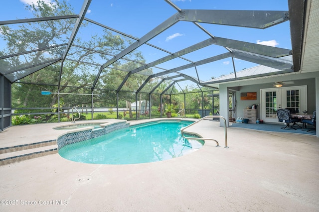 9495 Fleming Grant Rd, Sebastian, FL 32976 - view of swimming pool featuring french doors, a patio area, a pool with connected hot tub, and a lanai