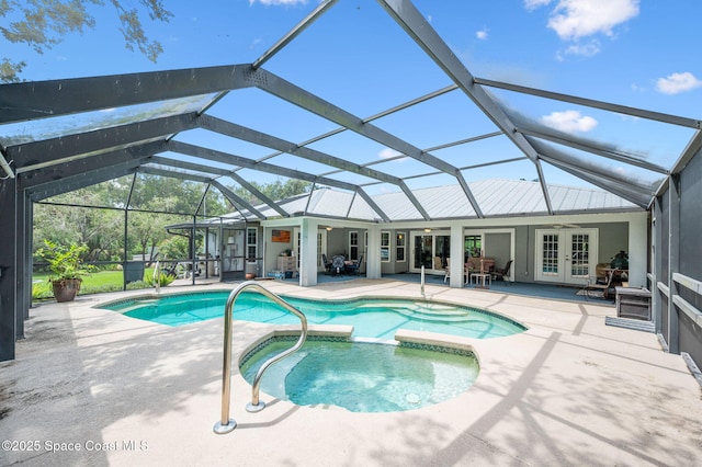 9495 Fleming Grant Rd, Sebastian, FL 32976 - view of pool featuring french doors, ceiling fan, a patio, a pool with connected hot tub, and a lanai