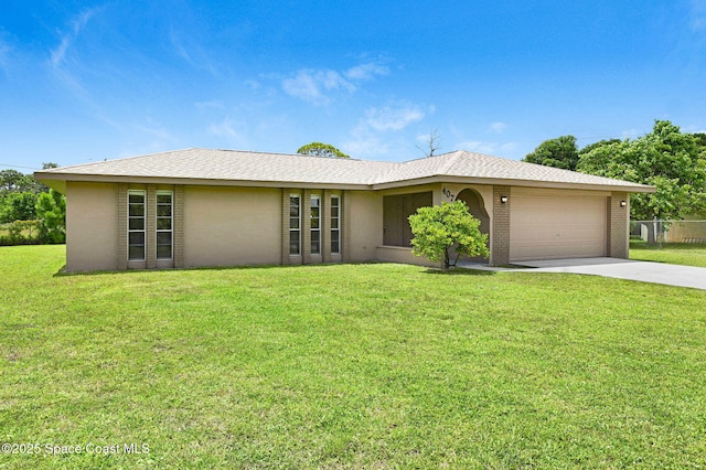 407 Heather Ave NE, Palm Bay, FL 32907 - single story home with driveway, an attached garage, and stucco siding