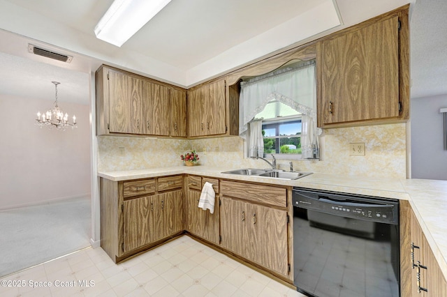 407 Heather Ave NE, Palm Bay, FL 32907 - kitchen featuring dishwasher, light countertops, a chandelier, tasteful backsplash, and light floors
