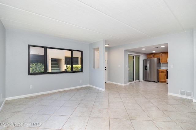 1145 N Shannon Ave Unit 29, Indialantic, FL 32903 - unfurnished living room featuring light tile patterned flooring and recessed lighting