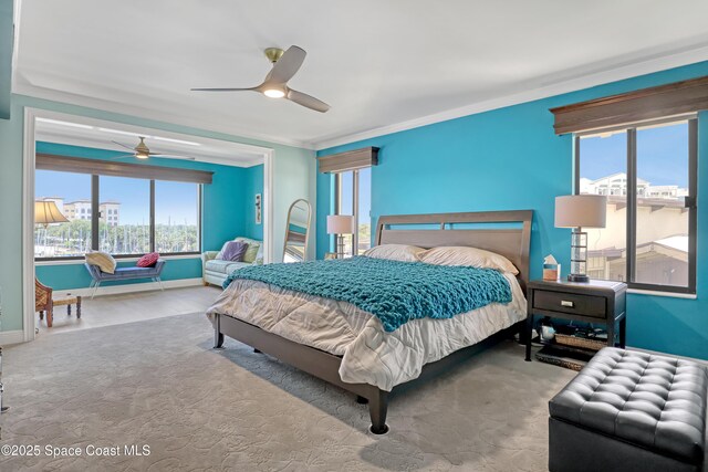 2220 Front St Unit 401, Melbourne, FL 32901 - bedroom featuring a ceiling fan and ornamental molding