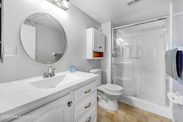 2467 S Washington Ave Unit 103B, Titusville, FL 32780 - bathroom with vanity, a stall shower, and stone finish floors