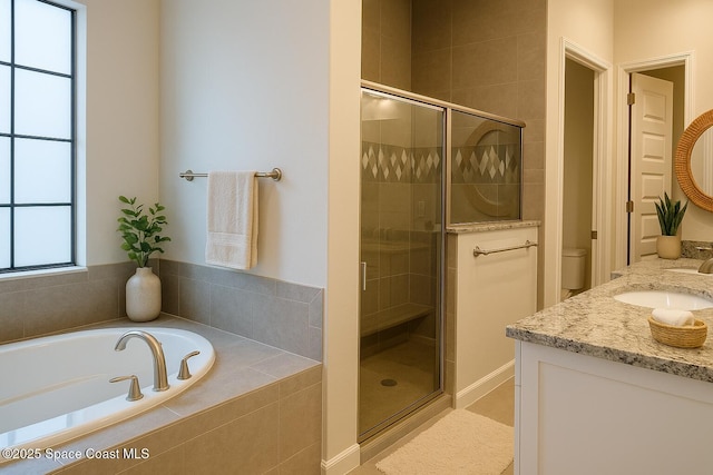 6684 Vista Hermosa Dr, Melbourne, FL 32940 - bathroom with a garden tub, a stall shower, and vanity