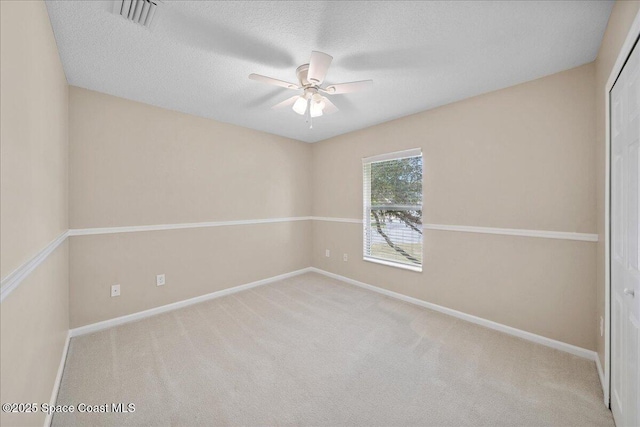2605 Revolution St Unit 104, Melbourne, FL 32935 - carpeted spare room featuring a ceiling fan and a textured ceiling