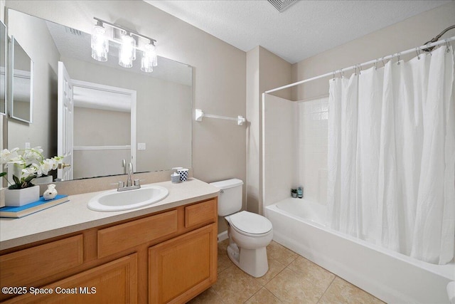 2605 Revolution St Unit 104, Melbourne, FL 32935 - bathroom with vanity, tile patterned floors, shower / tub combo with curtain, and a textured ceiling