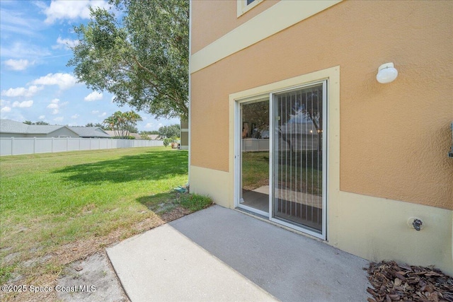 2605 Revolution St Unit 104, Melbourne, FL 32935 - property entrance with a patio area and stucco siding