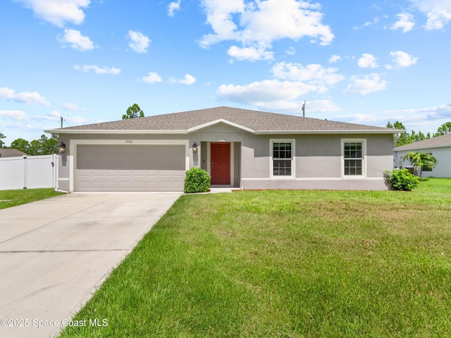 2926 Tishman Rd SE, Palm Bay, FL 32909 - single story home with stucco siding, a garage, concrete driveway, and a gate