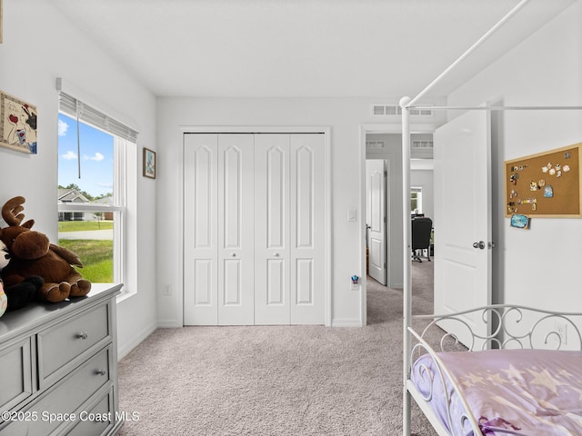 2926 Tishman Rd SE, Palm Bay, FL 32909 - carpeted bedroom with a closet and baseboards