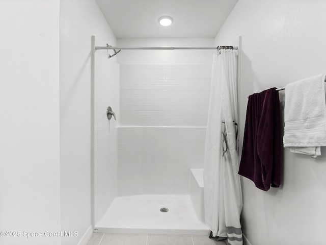 2926 Tishman Rd SE, Palm Bay, FL 32909 - full bathroom with tiled shower and tile patterned floors