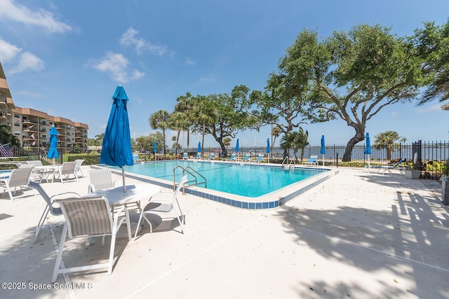 1049 Rockledge Dr Unit 507B, Rockledge, FL 32955 - community pool with a patio