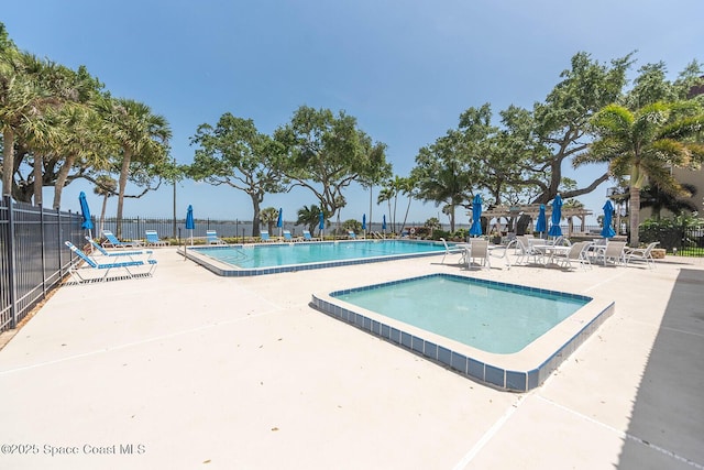 1049 Rockledge Dr Unit 507B, Rockledge, FL 32955 - community pool featuring a patio area