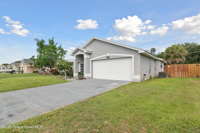 897 Hunters Creek Dr, Melbourne, FL 32904 - view of front of house featuring stucco siding, a garage, and driveway