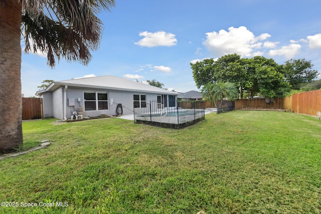 897 Hunters Creek Dr, Melbourne, FL 32904 - fenced backyard featuring a patio area