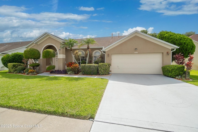 4808 Springwater Cir, Melbourne, FL 32940 - view of front facade featuring stucco siding, driveway, an attached garage, and a front yard