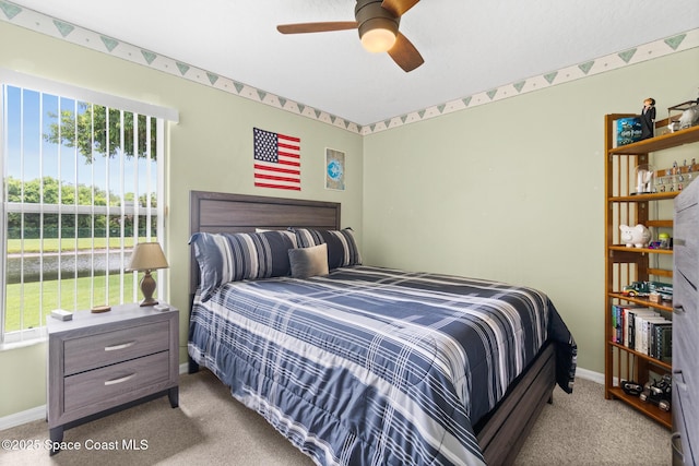 4808 Springwater Cir, Melbourne, FL 32940 - bedroom with carpet and a ceiling fan
