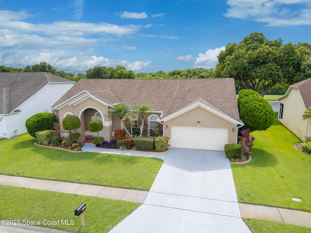 4808 Springwater Cir, Melbourne, FL 32940 - view of front of home with stucco siding, a garage, a front yard, driveway, and a shingled roof