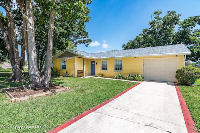 3384 Elizabeth St, West Melbourne, FL 32904 - single story home with a garage, a front lawn, and concrete driveway