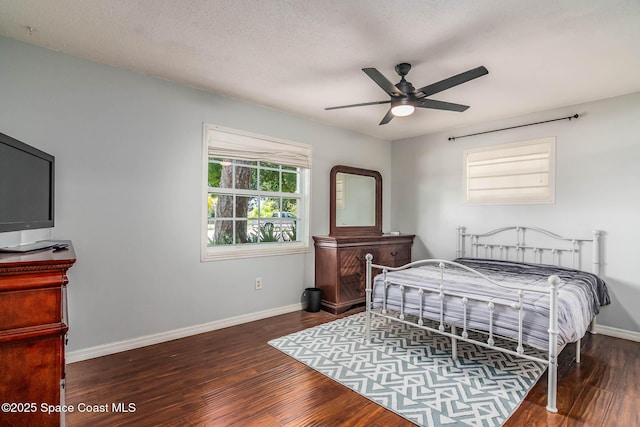 3384 Elizabeth St, West Melbourne, FL 32904 - bedroom with wood finished floors and ceiling fan