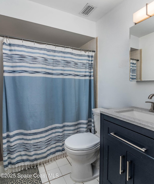 3384 Elizabeth St, West Melbourne, FL 32904 - full bathroom featuring vanity and tile patterned flooring