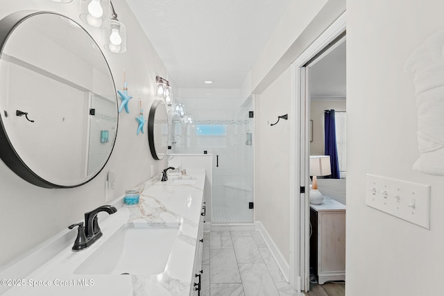 430 Watts Way, Cocoa Beach, FL 32931 - full bath with double vanity, marble finish floors, and a shower stall