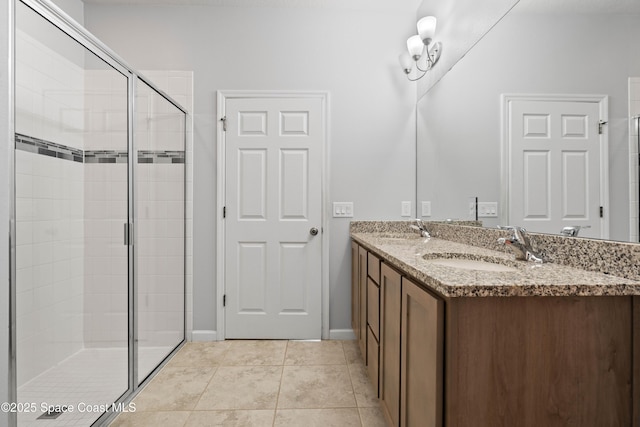 416 Ladyslipper St, Palm Bay, FL 32908 - bathroom with a stall shower, double vanity, and tile patterned floors