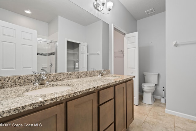 416 Ladyslipper St, Palm Bay, FL 32908 - full bathroom with a stall shower, a spacious closet, double vanity, and tile patterned floors