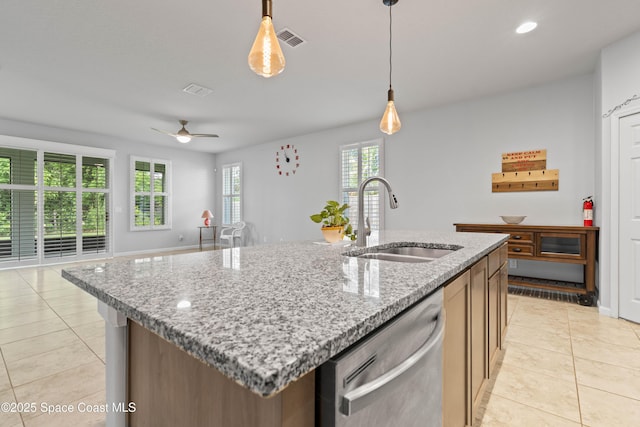 416 Ladyslipper St, Palm Bay, FL 32908 - kitchen with stainless steel dishwasher, light tile patterned floors, a ceiling fan, pendant lighting, and recessed lighting