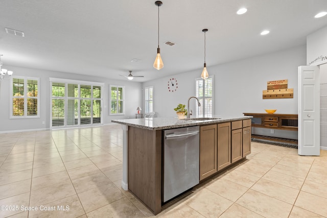 416 Ladyslipper St, Palm Bay, FL 32908 - kitchen with dishwasher, light tile patterned flooring, open floor plan, recessed lighting, and light stone counters