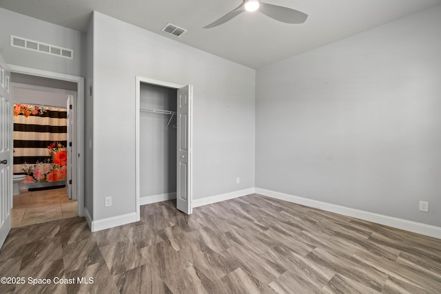 416 Ladyslipper St, Palm Bay, FL 32908 - unfurnished bedroom featuring a closet and ceiling fan