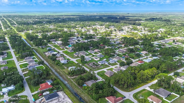 416 Ladyslipper St, Palm Bay, FL 32908 - aerial overview of property's location with nearby suburban area
