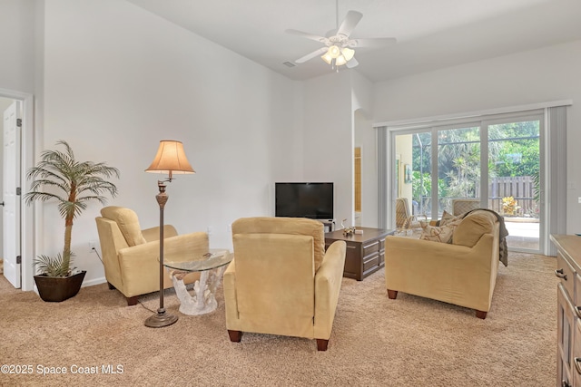 143 Sanibel Way, Melbourne Beach, FL 32951 - living area featuring light colored carpet and a ceiling fan